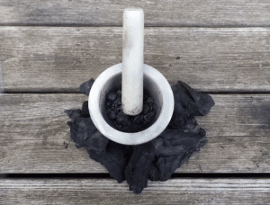 mortar-and-pestle-to-grind-charcoal-into-dust